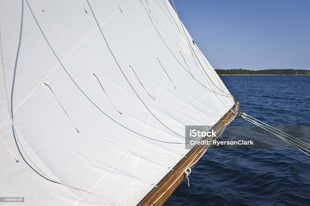 Sailboat Sailing on Mahone Bay, Nova Scotia, Canada. Main sail sheet out on a sailboat sailing on Mahone Bay, Nova Scotia. Canada Stock Photo