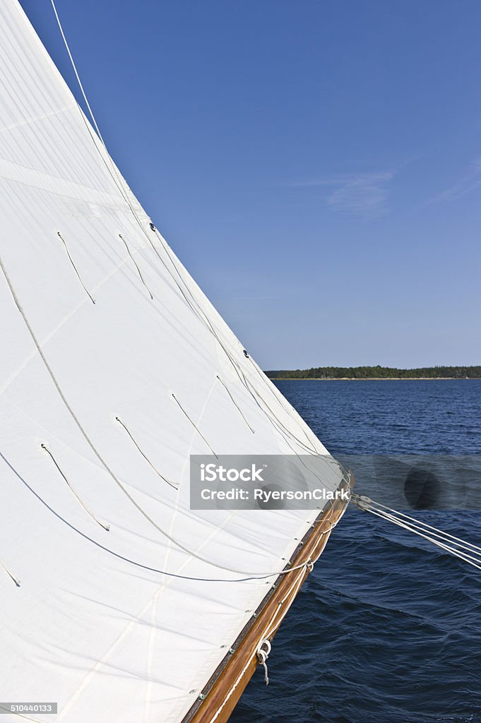 Sailboat Sailing on Mahone Bay, Nova Scotia, Canada. Main sail sheet out on a sailboat sailing on Mahone Bay, Nova Scotia. Canada Stock Photo