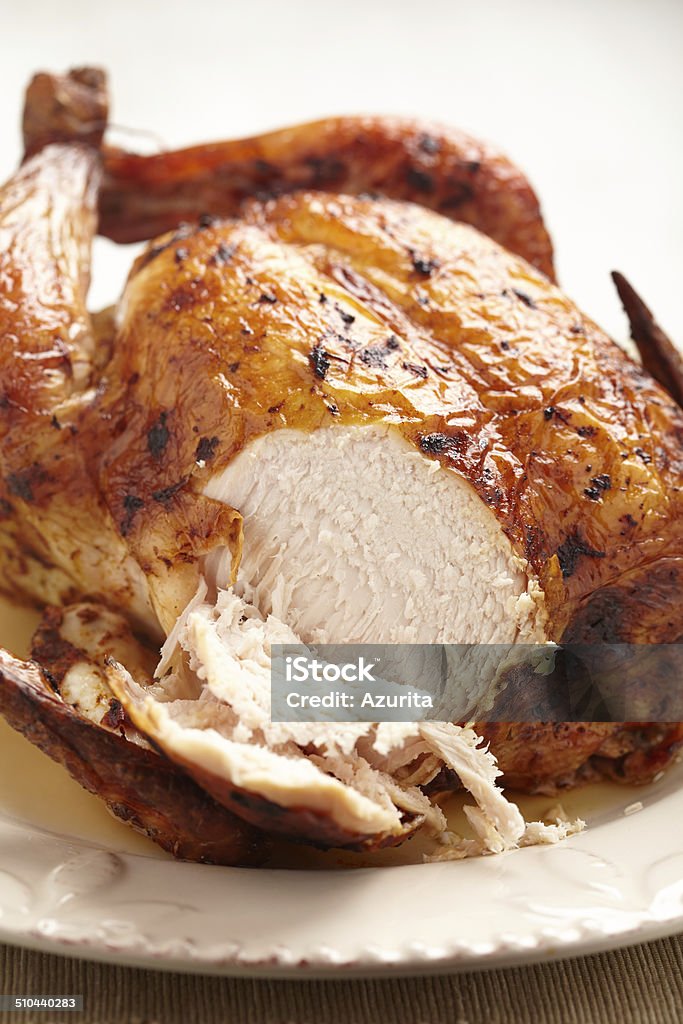 Whole Roasted Chicken Whole Roasted Chicken on plate for holidays Baked Stock Photo