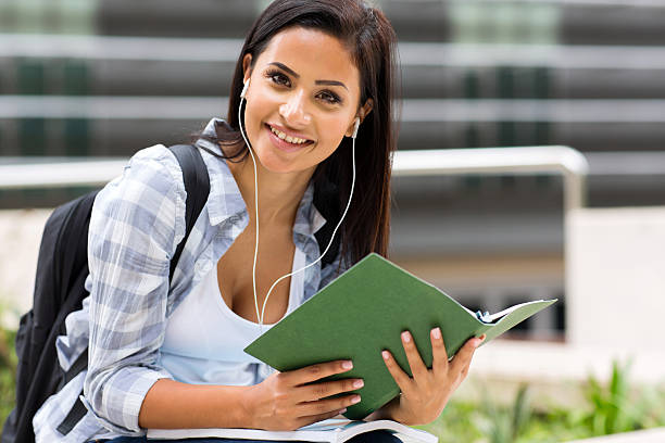 istock female university student listening music 510440325