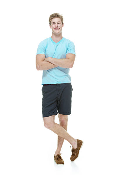 istock Cheerful man standing with arms crossed 510442513