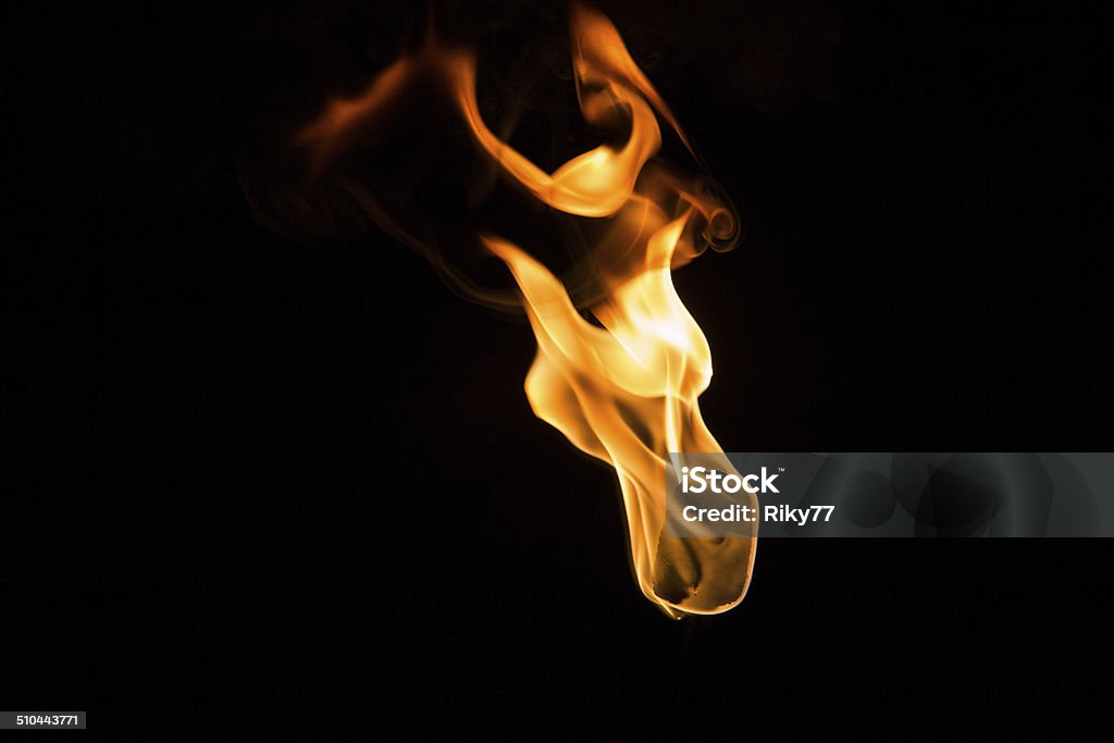 Fire torch Fire torhc in black background Beauty In Nature Stock Photo