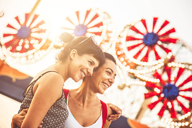 istock Two friends at amusement park 510443955