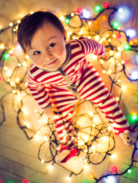 Little baby-girl with Christmas decoration