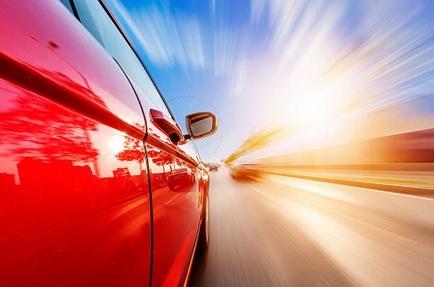 istock car on the road with motion blur background 510461163