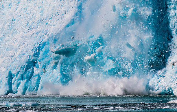 Northwestern Glacier calving into the sea stock photo