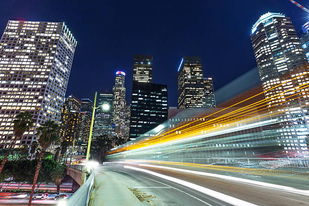 istock traffic through urban with sunset in los angle 510462214