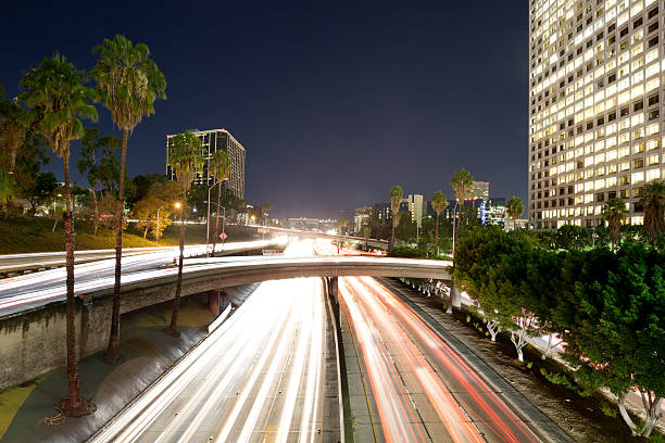 istock traffic through urban with sunset in los angle 510462276