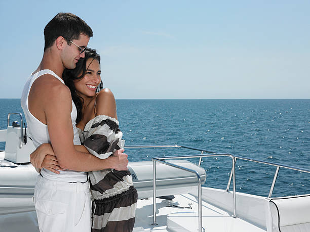 istock Couple Embracing On Yacht 510462931
