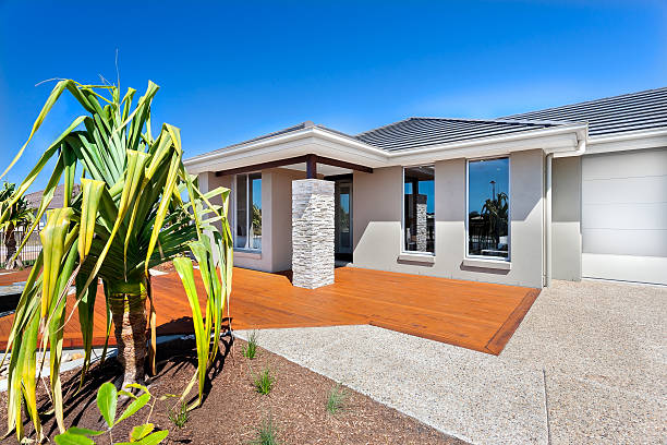 istock Modern house with a tree and the garage 510464112