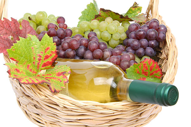 istock Basket with white wine and grapes 510467923