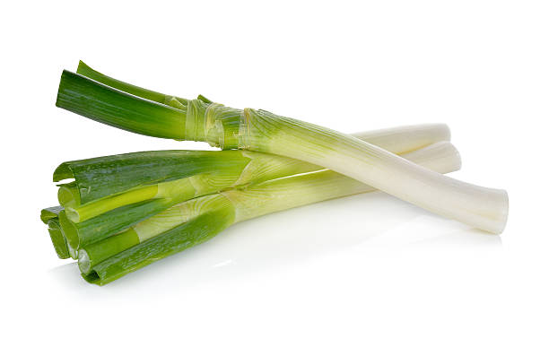 istock fresh green Japanese Bunching Onion on white background 510469194