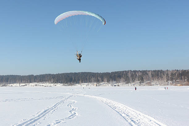 istock The person flying on a motorized para-plane 510469640