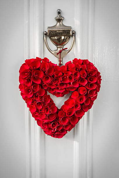 istock Heart Shaped Reef hanging on a White Door 510473924