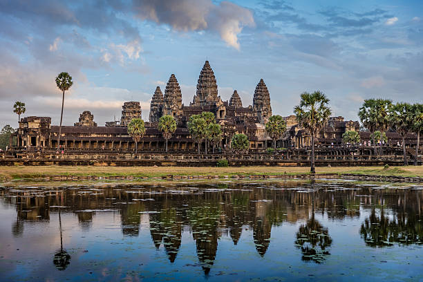 Angkor Wat Sunrise Cambodia Monumental Angkor Wat Temple in early morning light after sunrise under beautiful cloudy sky. Angkor Wat, Siem Reap, Cambodia, Asia. angkor stock pictures, royalty-free photos & images