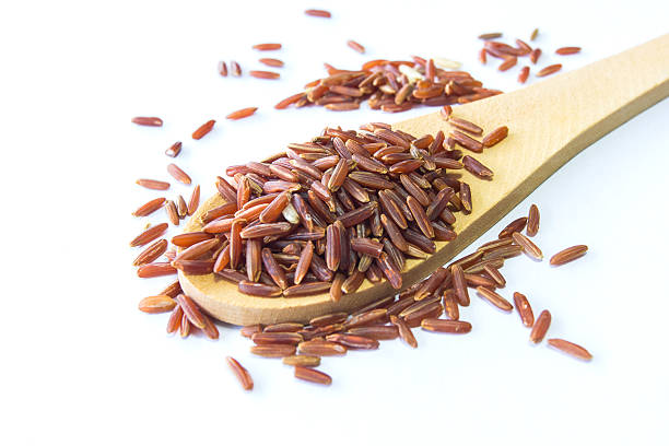 istock Organic Riceberry Rice (black jasmine rice) isolated on white 510477216