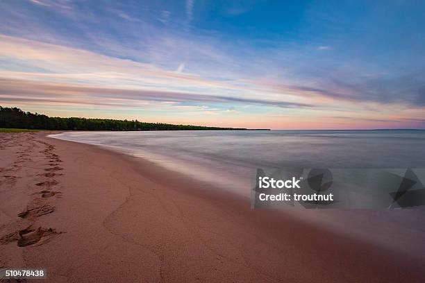 Sunset Over Lake Superior Stock Photo - Download Image Now - Wisconsin, Lake Superior, Beach