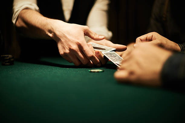 Dealer's hands Male hands dealing cards dealing cards stock pictures, royalty-free photos & images