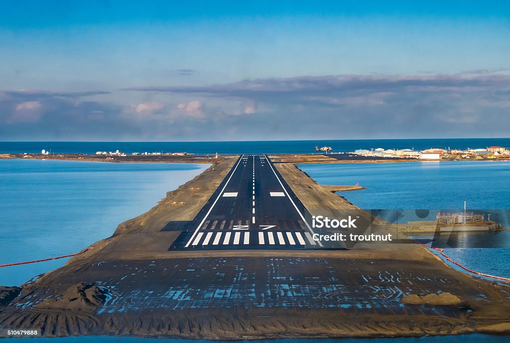 Coming in for a landing in Kotzebue The airport in the remote arctic village of Kotzebue, Alaska juts out into an artificial peninsula near the Chukchi Sea Alaska - US State Stock Photo