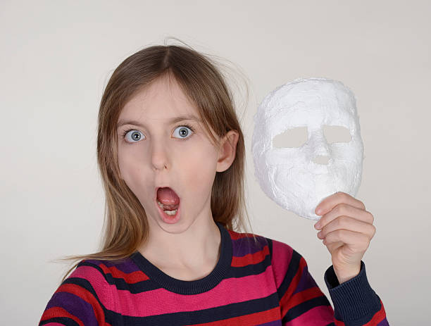 istock girl with mask 510479906