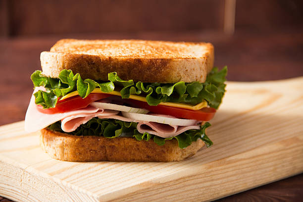 istock Sandwich on a wooden table 510482572