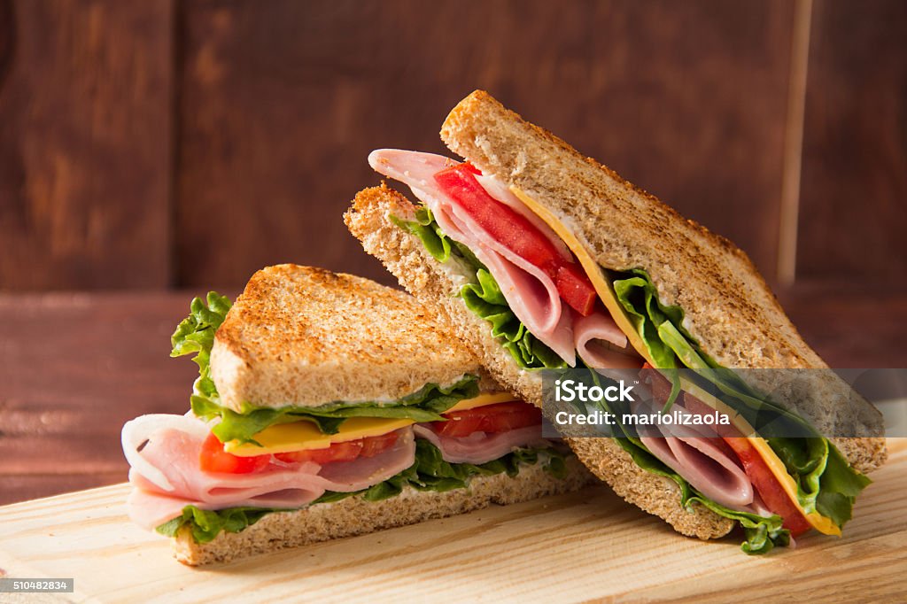 Sandwich bread tomato, lettuce and yellow cheese Sandwich Stock Photo