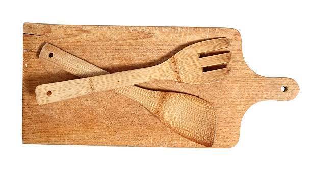 istock Wooden cutting board with spatula. Isolated with clipping path. 510483864