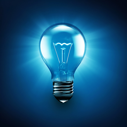 glowing light bulb on a blue background