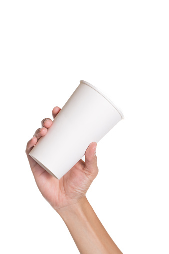 istock Hand holding a coffee mug on white background 510487186