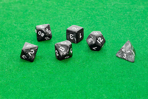 istock Specialized polyhedral dice for role-playing games on green clot 510487236