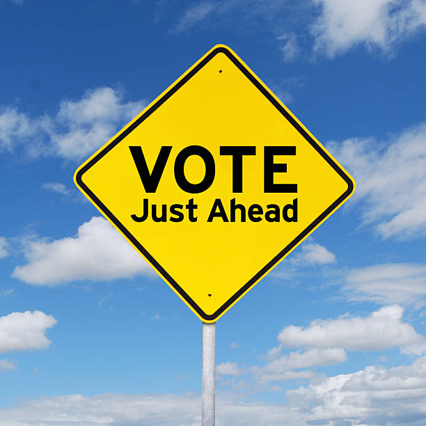 istock Signboard guide to vote just ahead 510488154