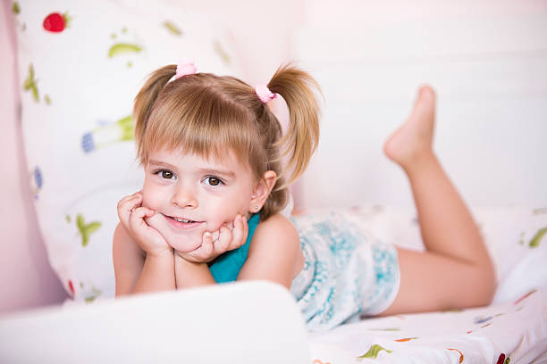 istock Little girl smiling 510488593