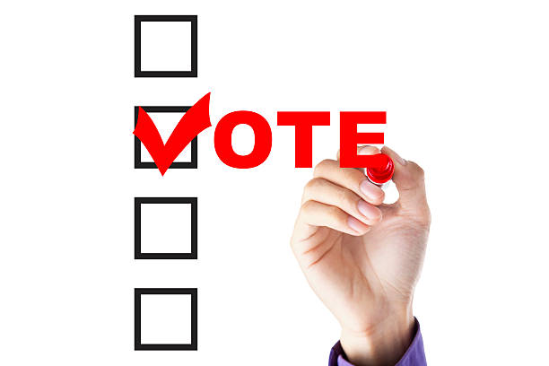 istock Person fill a voting form 510488966