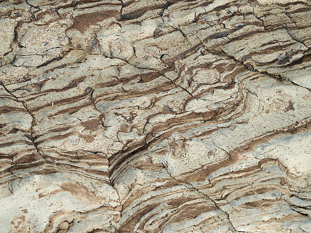 istock Brown waves on the surface of the stone. 510489448