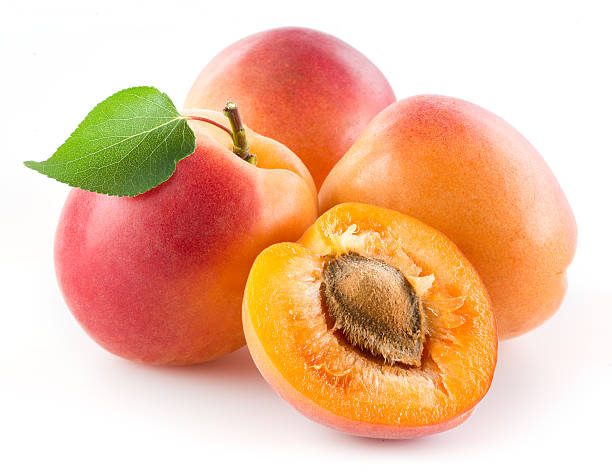 istock Apricots with leaf isolated on white 510489901