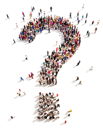 Large group of people with questions, thinking concept, or quest for answers on a white background.