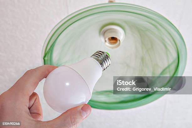 Closeup Of Energysaving Led Light Bulb In Human Hand Stock Photo - Download Image Now