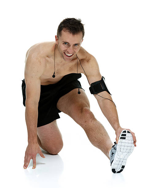 istock Happy male runner stretching 510490377
