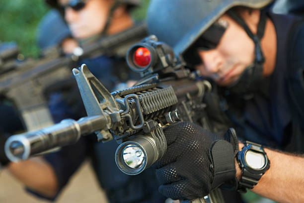 istock Swat officer aiming guns 510490539