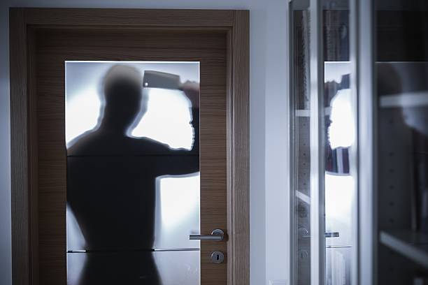 istock Dangerous criminal silhouette 510490590