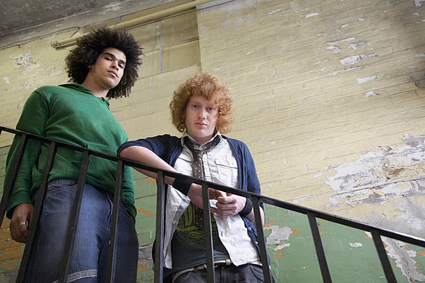 istock Men Standing By Railing Of Old Building 510490591