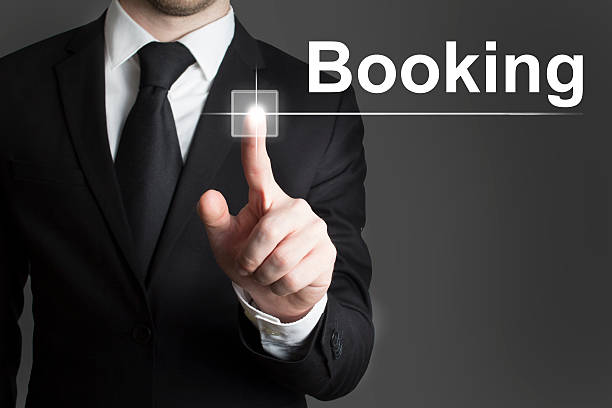 istock businessman pushing button Booking 510491279