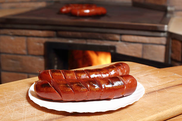 istock Grilled sausages at masonry oven background 510491646