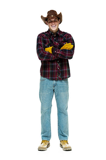 istock Smiling farmer standing with arms crossed 510491664