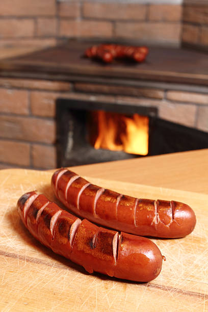 istock Grilled sausages at masonry oven background 510491736