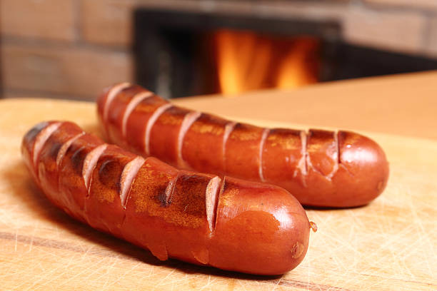 istock Grilled sausages at masonry oven background 510491786