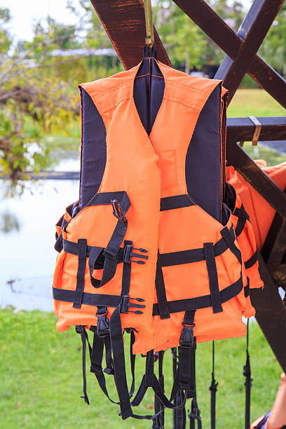 istock Orange life jackets and pool. 510492419
