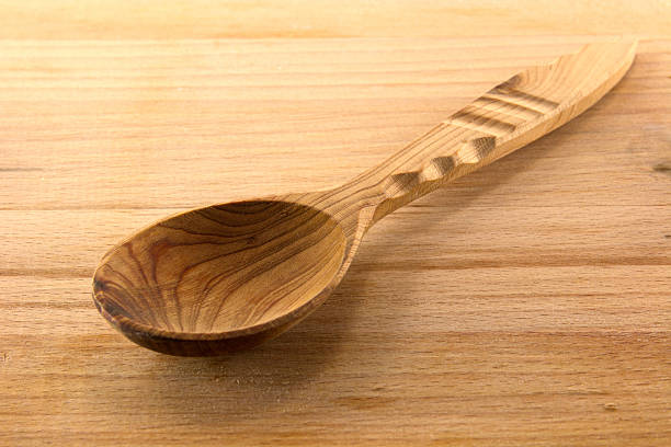 istock Wooden spoon on the board 510492504