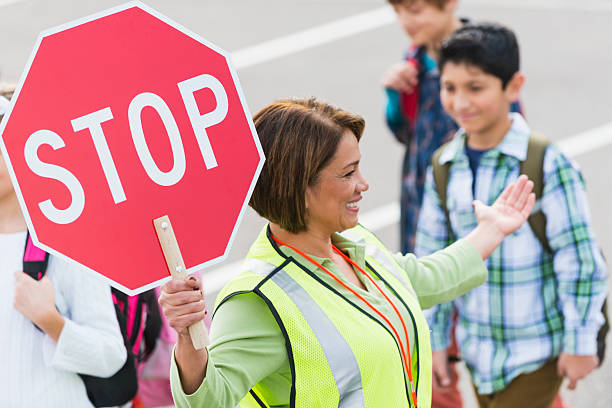 school crossing guard - education sign school crossing sign crossing stock-fotos und bilder