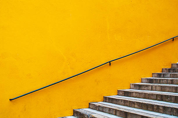 istock Yellow wall and stairs 510494063